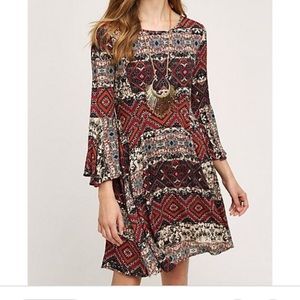 Anthropology holding horses dress